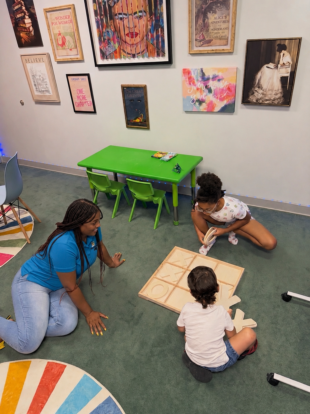 Students learning with a tutor in the studio